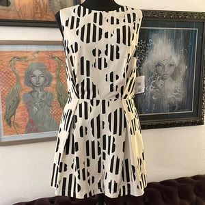 New TOPSHOP printed jumpsuit romper with lace back detail.